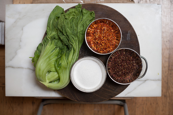 Ingredients for Kunming-style pickles: mustard greens, chili flakes, sichuan peppercorns, salt