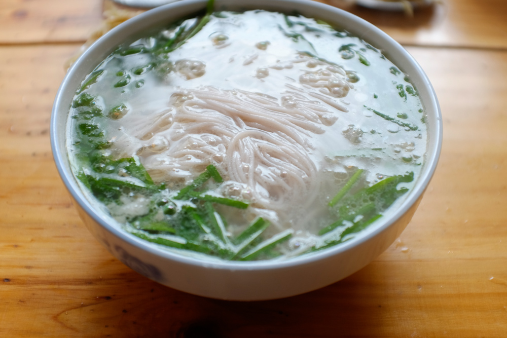 Super simple rice noodles with scallions in Yuanyang. Perfect for a cold, wet morning.
